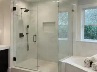 Finished frameless shower door installation