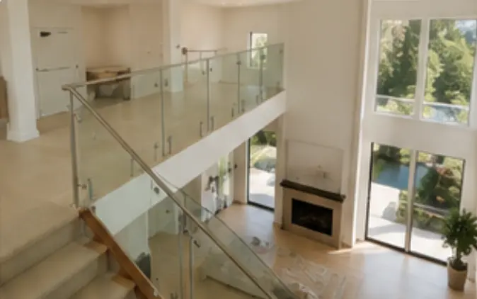 Finished clear glass staircase railing