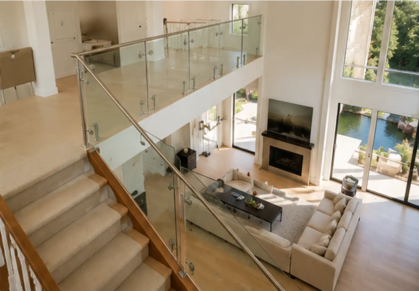 Completed staircase glass railing replacement in Medina, Washington