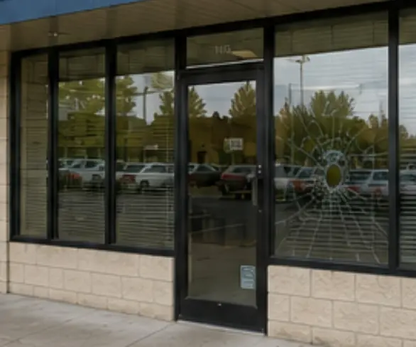 Storefront after the new tempered glass panel was installed